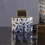 جرة سيراميك ذهبية صغيرة وودي